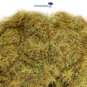 Close-up of WWScenics 4mm Dead Static Grass showing realistic dry, sun-bleached short grass fibers for wargaming, dioramas, and model railway scenery