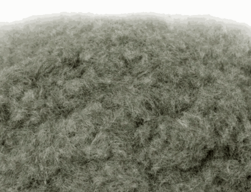 Close-up of WWScenics 2mm Melting Snow static grass fibers for miniature winter terrain modeling